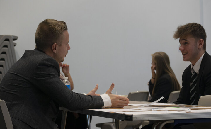 Image of Year 11 mix with employers and training providers for mock interview careers event